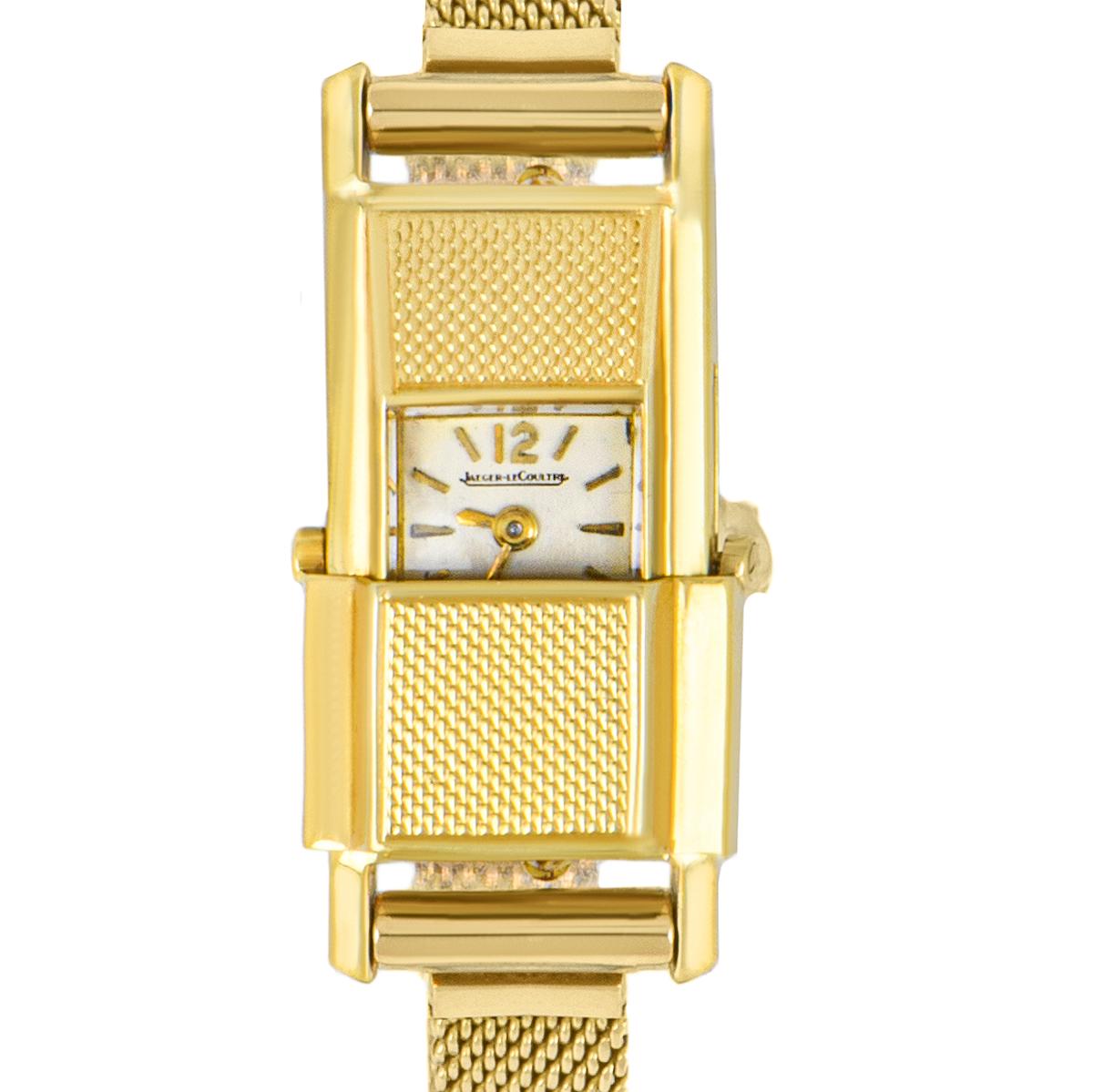 A Very Rare 1930's 18k Yellow Gold Duo Plan Ladies Wristwatch, silver dial with index batons, an 18k yellow gold bracelet with an 18k yellow gold pin buckle (not by JLC), mineral glass, manual wind movement, in excellent condition, comes with a