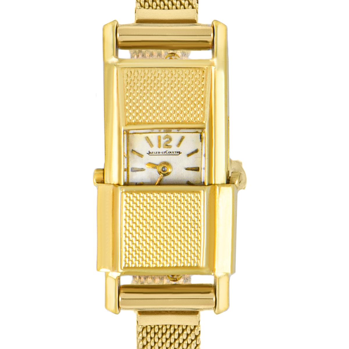 A Very Rare 1930's 18k Yellow Gold Duo Plan Ladies Wristwatch, silver dial with index batons, an 18k yellow gold bracelet with an 18k yellow gold pin buckle (not by JLC), mineral glass, manual wind movement, in excellent condition, comes with a