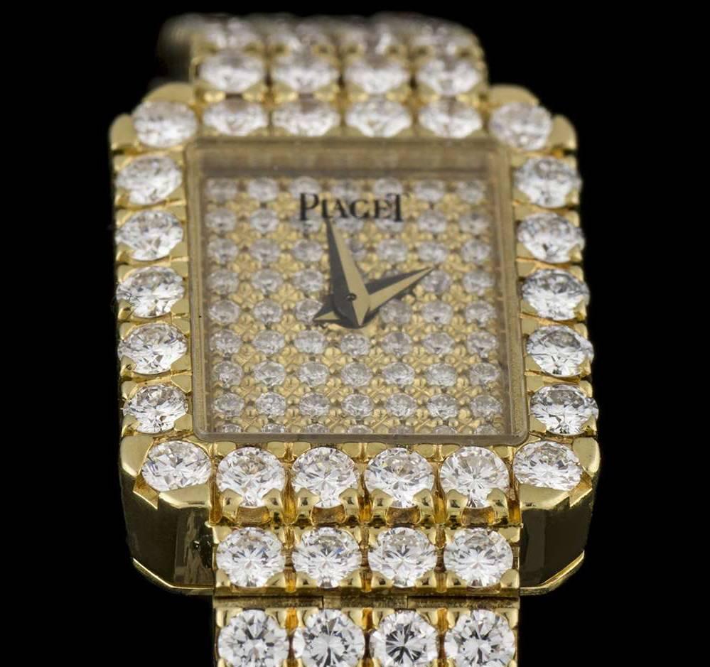 An Fully Loaded Lady Gold Tradition Diamond Wristwatch in 18k Yellow Gold, pave diamond dial set with approximately 62 round brilliant diamonds, a fixed 18k yellow gold bezel set with approximately 22 round brilliant diamonds, an 18k yellow gold