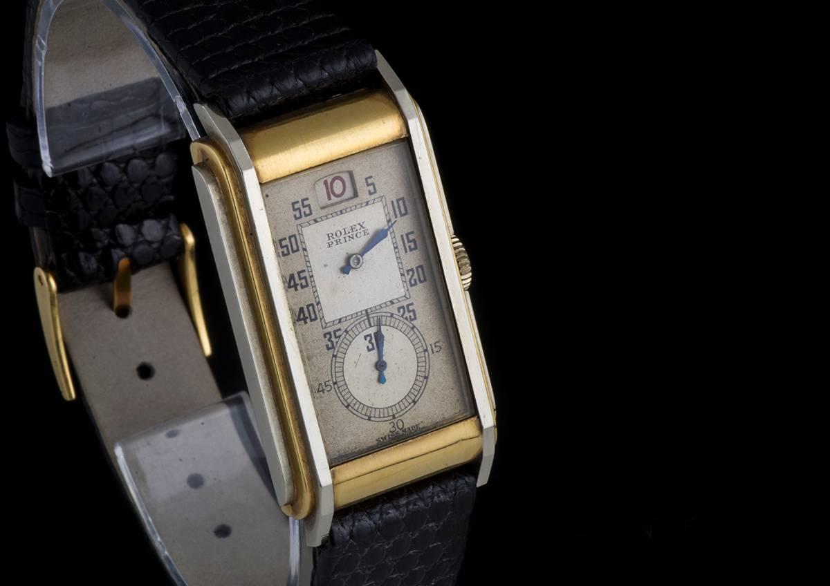 An 18k Yellow Gold and White Gold Very Rare "Jump Hour" Railway Prince Wristwatch 1571, silvered dial with arabic numbers and minute railtrack, red jump-hour aperture at 12 0'clock, small seconds sub-dial at 6 0'clock, a fixed 18k yellow