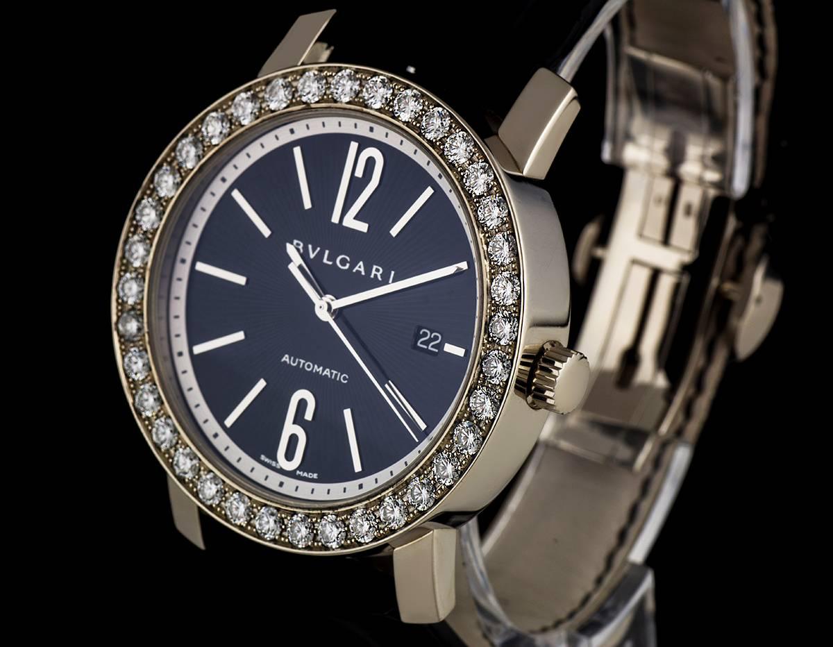 An 18k Bulgari Bulgari Gents Wristwatch BBW42C5GDLDAUTO,  black dial with index batons and arabic numbers 6 and 12, date at 3 0'clock, case set with 36 round brilliant cut diamonds, an original brand new black leather strap with an 18k white gold