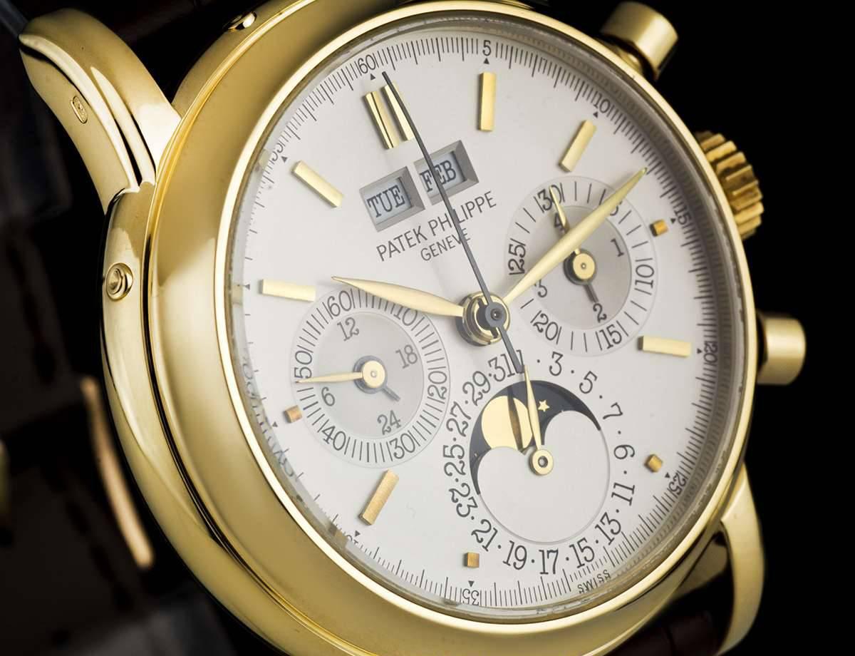 An 18k Yellow Gold Perpetual Calendar Chronograph Gents Wristwatch 3970J, opaline silver dial with applied index batons, 30 minute recorder and leap year indicator at 3 0'clock, date sub-dial and moonphase at 6 0'clock, small seconds and 24 hour