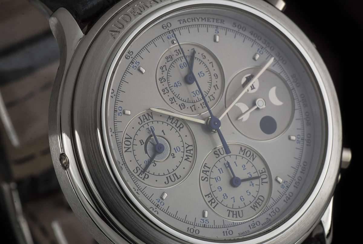 Platinum Millenary Perpetual Calendar Moonphase Chronograph Wristwatch, silvered dial with applied hour markers, moonphase aperture at 3 0'clock, 12 hour recorder and weekday sub-dial at 6 0'clock, leap year indicator, 30 minute recorder and month