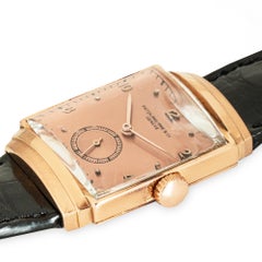 Patek Philippe, modelo raro con asas en forma de capucha, referencia 1410, de 1939, cuadrado, de oro rosa, 25 mm