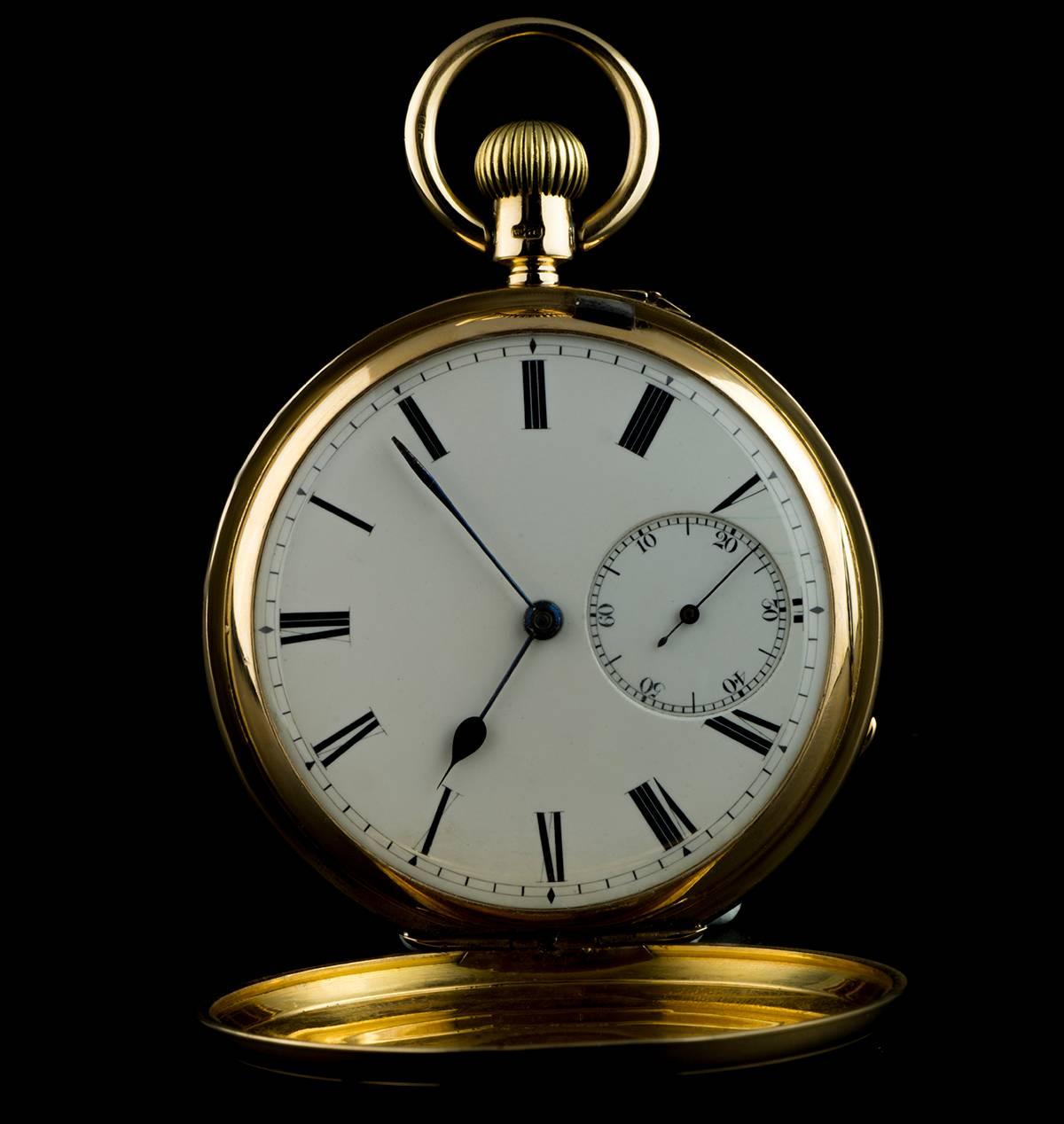 A Gold Vintage Full Hunter Pocket Watch, white enamel dial with roman numerals, small seconds at 6 0'clock, a fixed gold bezel and case, a gold inner cuvette case, plastic glass, exhibition caseback, 3/4 plate Karrusel lever movement, in excellent