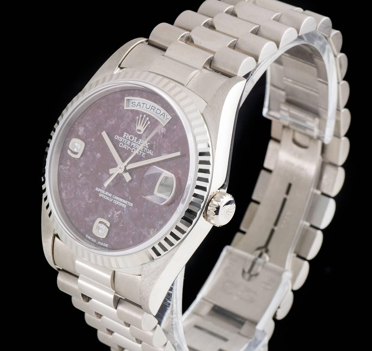 An Unworn 18k White Gold Oyster Perpetual Day-Date NOS Gents Wristwatch, ultra rare grossular stone dial with applied arabic numbers 6 and 9 - each set with a single round brilliant cut diamond, day at 12 0'clock, date at 3 0'clock, a fixed 18k