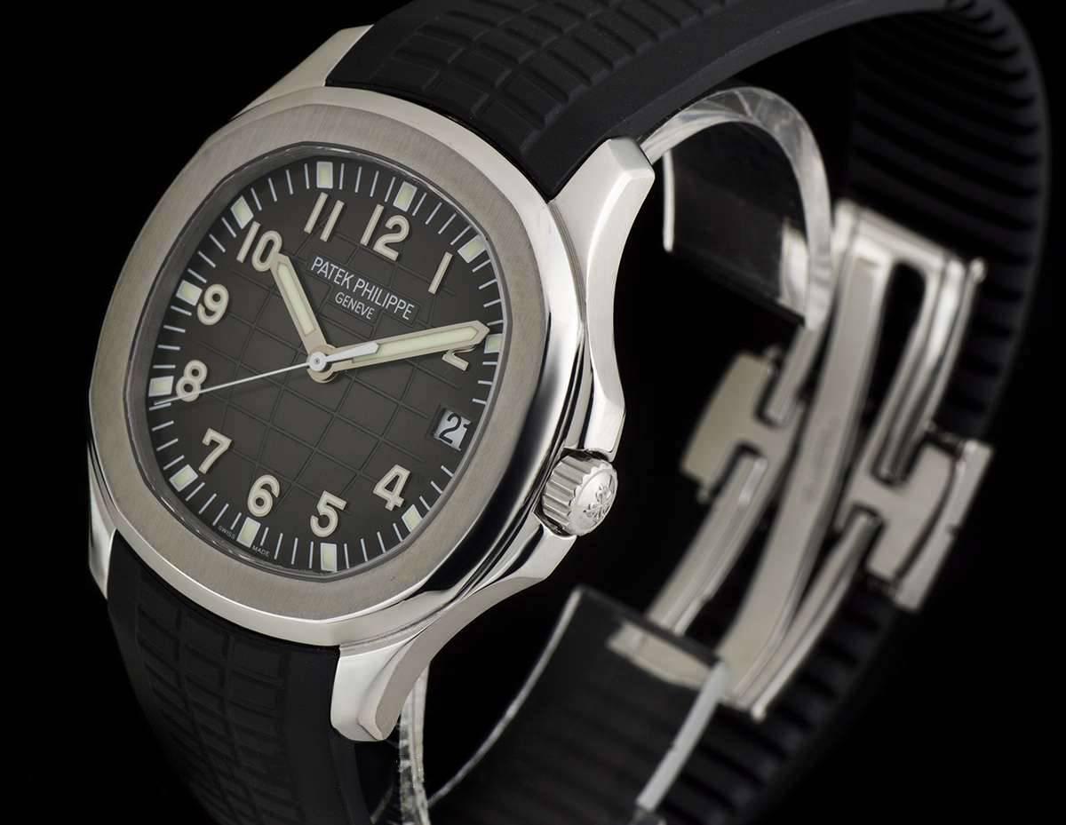 An Unworn Stainless Steel Jumbo Aquanaut Gents Wristwatch, black embossed dial with applied arabic numbers, date at 3 0'clock, a fixed stainless steel bezel, an original matching black "Tropical" composite strap with an original stainless