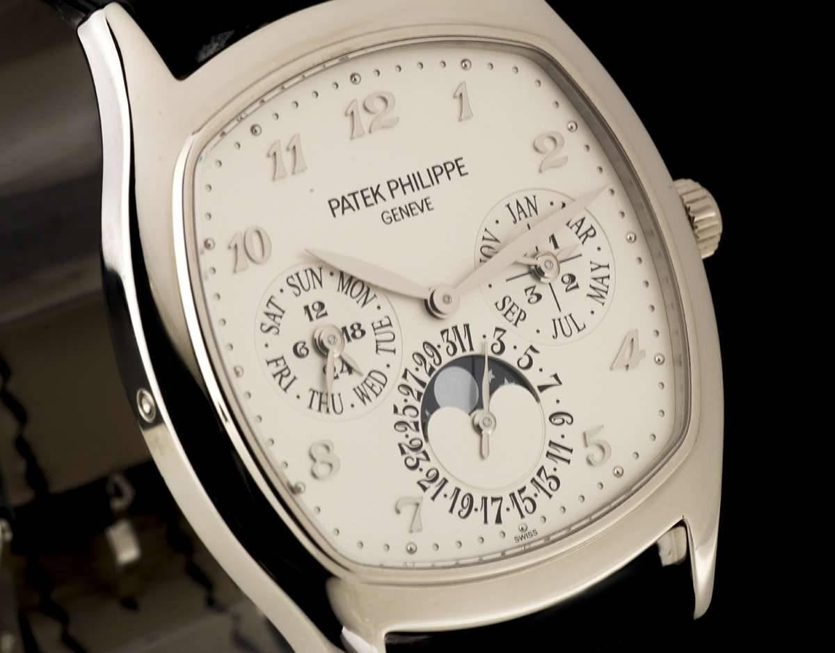 An Unworn 18k White Gold Perpetual Calendar Moonphase Gents Wristwatch, silvered dial with applied Breguet style arabic numbers, month sub-dial with leap year indiciator at 3 0'clock, date sub-dial with moonphase aperture at at 6 0'clock, weekday