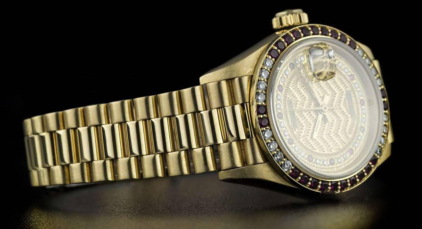 Women's Rolex Gold Rare String Dial Ruby and Diamond Datejust 69068 Automatic Wristwatch