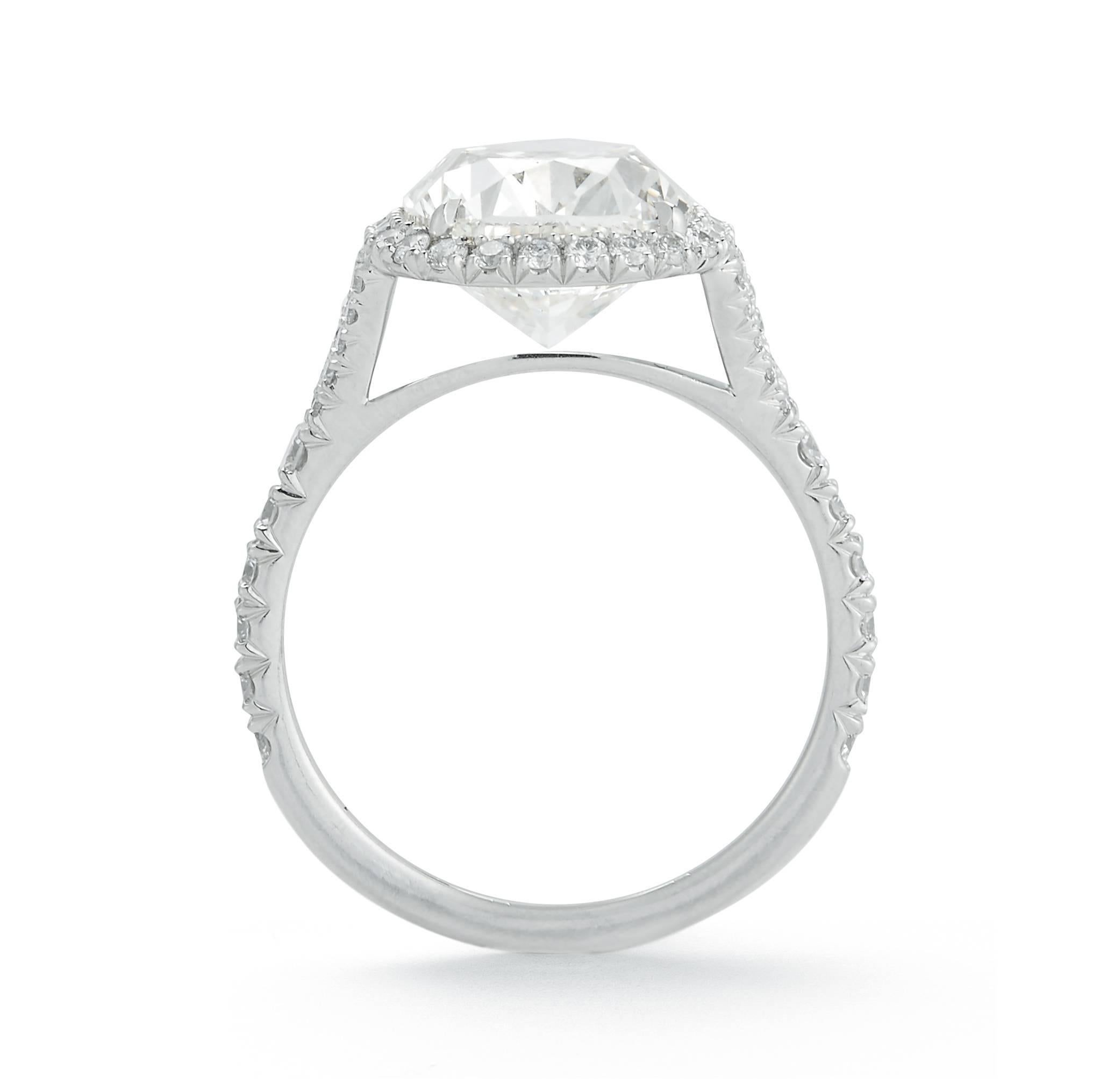 Set with a cushion-cut diamond, weighing 4.51 carats, within a diamond halo and diamond detail, mounted in platinum

Ring size 6, can be sized

Accompanied by report 2155187670 dated 17 January 2013 from the Gemological Institute of America stating
