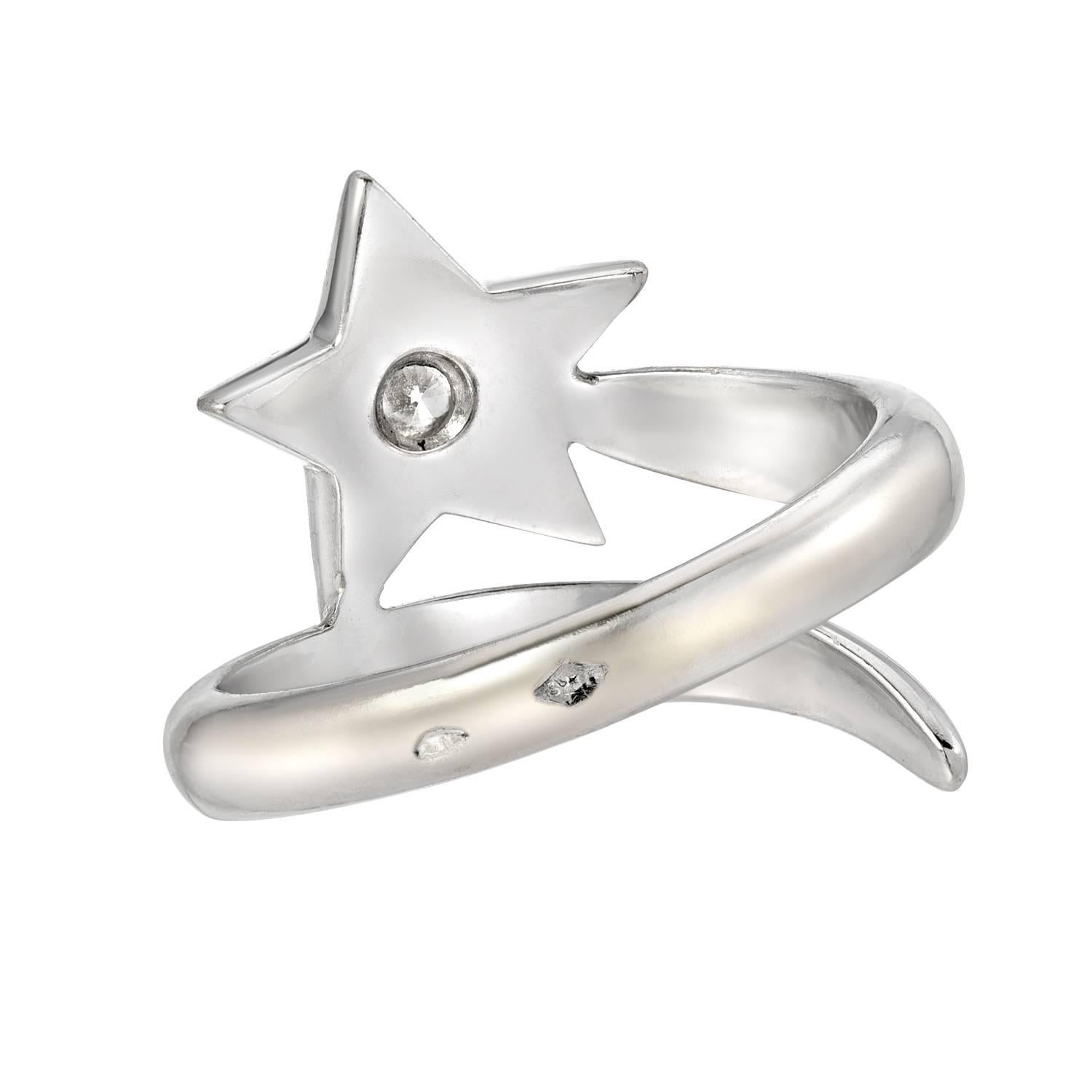 Designed as a shooting star, with a brilliant-cut diamond, mounted in 18k white gold
Weight of the diamond approximately 0.10 carats
Size 6.5

Super cute ring!!