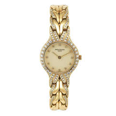Patek Philippe Lady's Yellow Gold and Diamond La Flamme Bracelet Watch