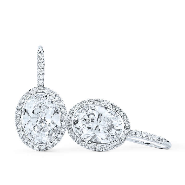 One pair of Oval Diamond Silhouette Earrings weighing 6.65 carats in total. The diamonds are FG in color and VS in clarity.