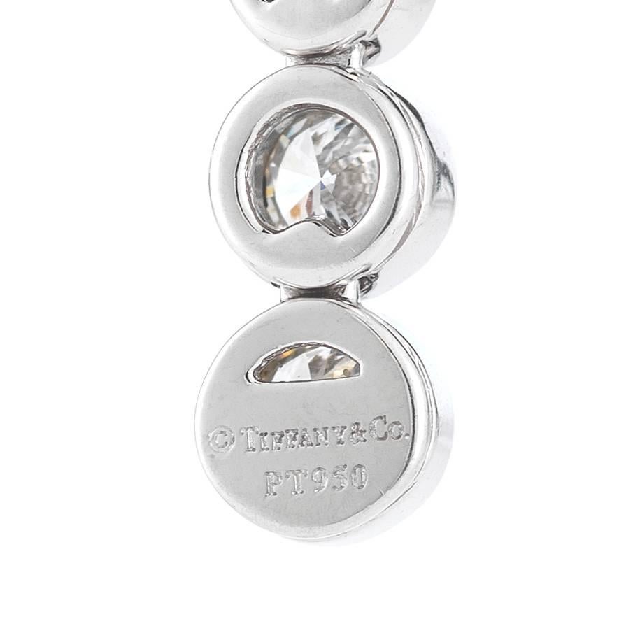 An elegant and special Jazz pendant from Tiffany & Co. The pendant is set in Platinum, and 16