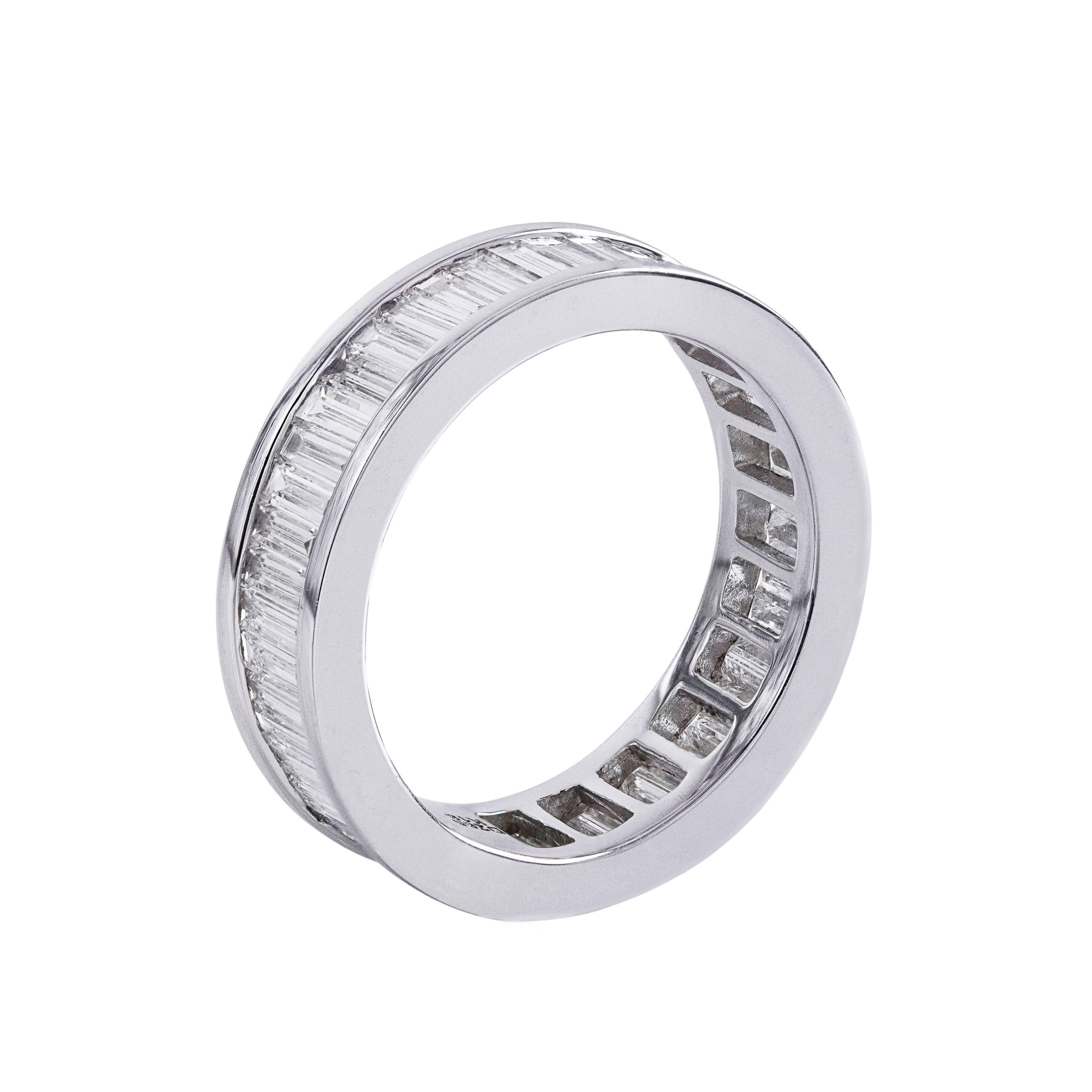 Eternity Wedding band channel set with 2.65 carats of brilliant baguette diamonds all around. Made in 18k white gold. Size is approximately 6 3/4 US.

Style available in different price ranges. Prices are based on your selection of the 4C’s (Carat,