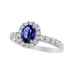 Bague de fiançailles en or avec saphir bleu 1,02 carat et halo de diamants