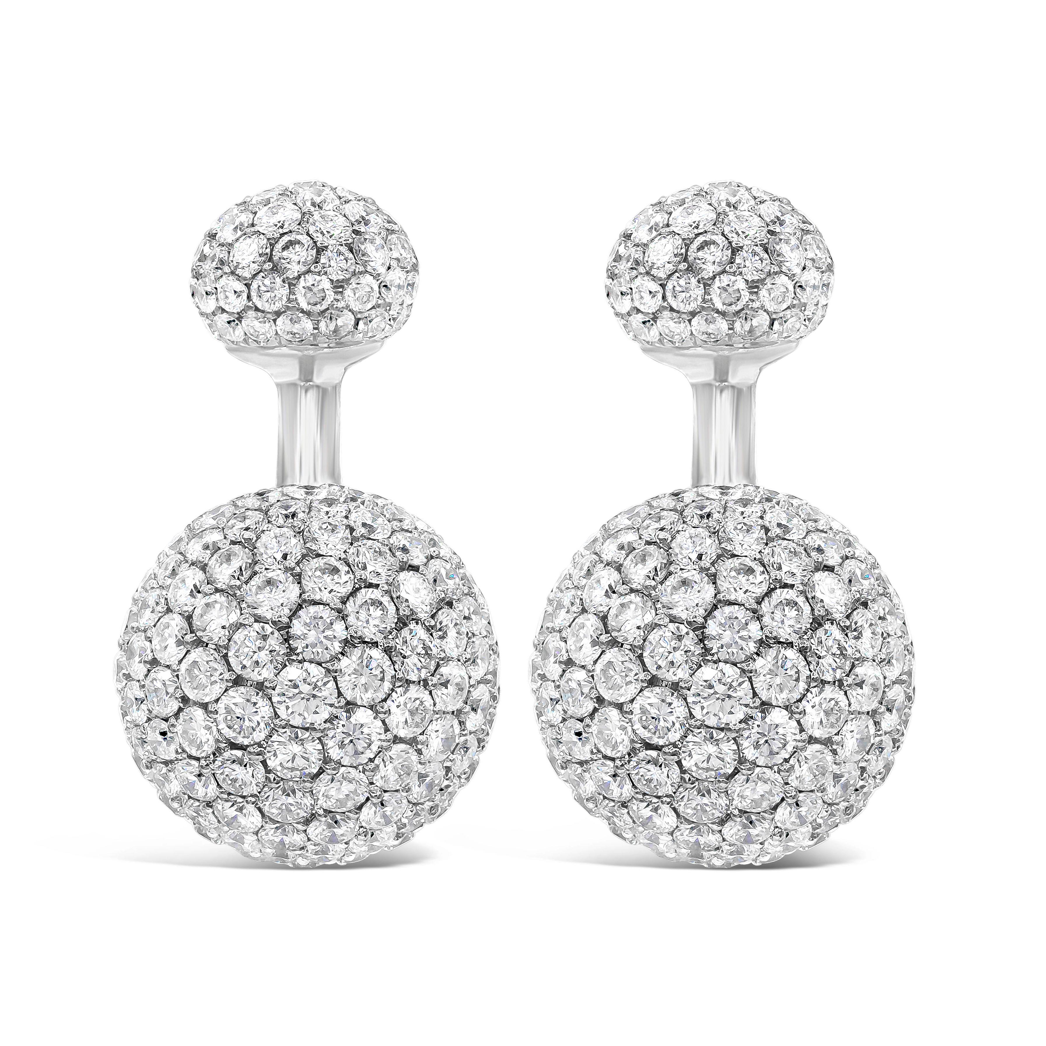 An intricately designed 18k white gold cufflinks showcasing a diamond encrusted face. The ball return back also micro-pave set with sparkling diamonds. Diamonds weigh 6.08 carats total. 

Style available in different price ranges. Prices are based