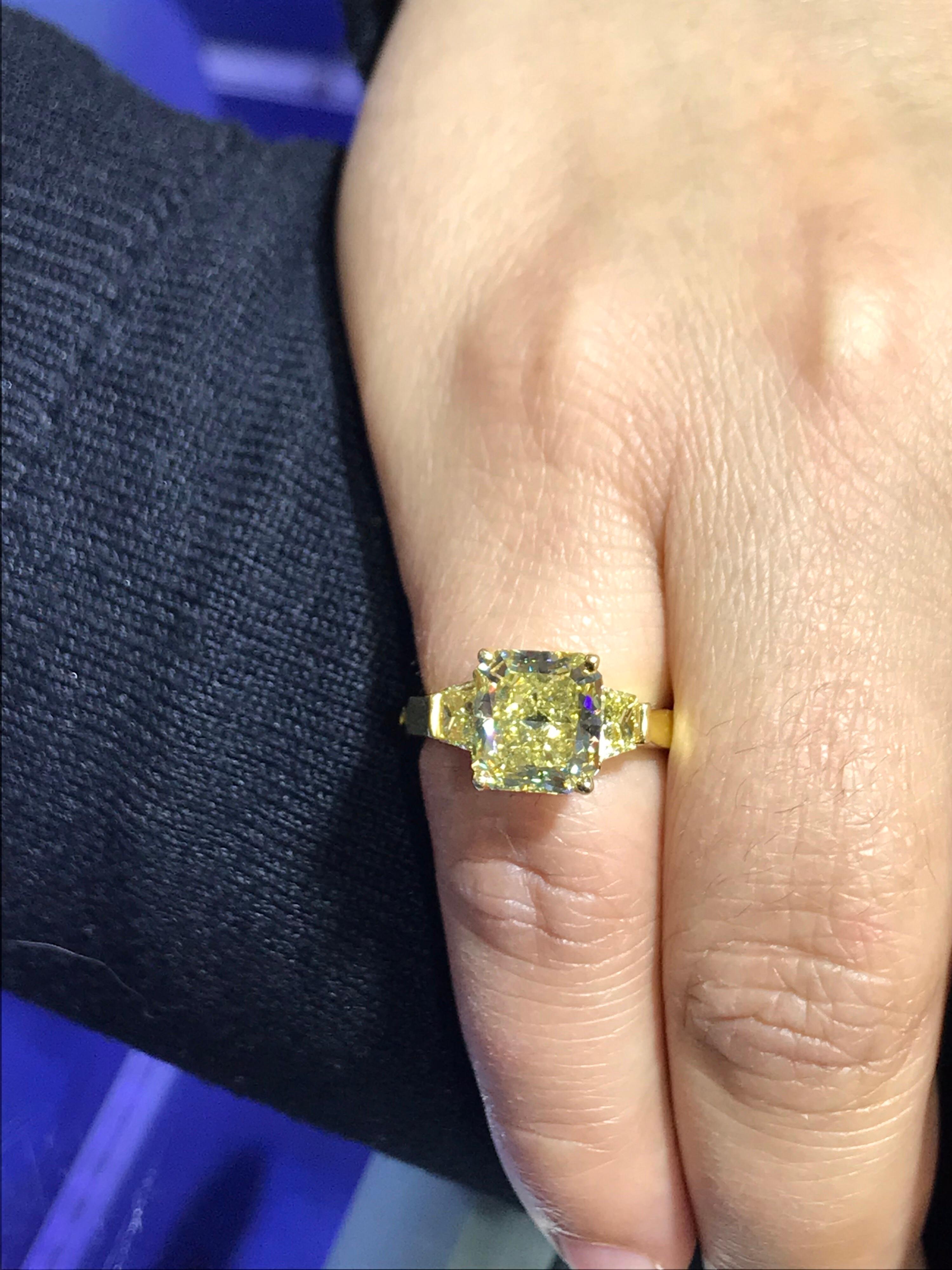 three stone yellow diamond ring