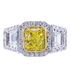 GIA Certified Fancy Intense Yellow Three-Stone Halo Engagement Ring 4