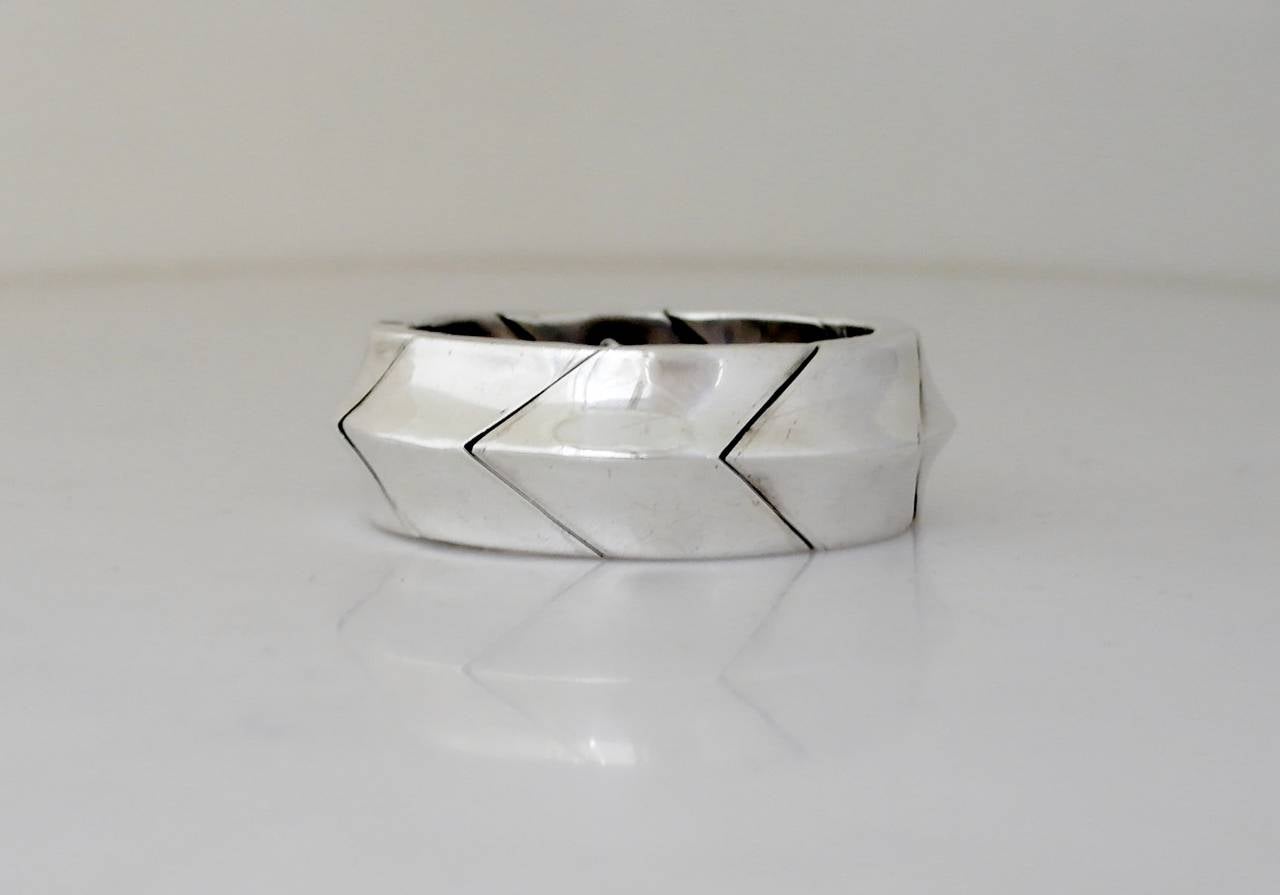 Being offered is a circa 1967 .970 silver bracelet by Antonio Pineda of Taxco, Mexico. Large bracelet comprising chevron form links; tongue & box closure. Dimensions: 1
