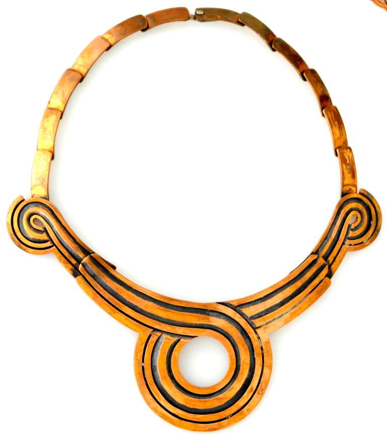 Being offered are a circa 1960s copper necklace & earrings set by Victoria of Taxco, Mexico; hand made set with incised lines on the drop pendant & earrings; pendant supported by copper links; tongue & box closure. Dimensions:  . Marked as