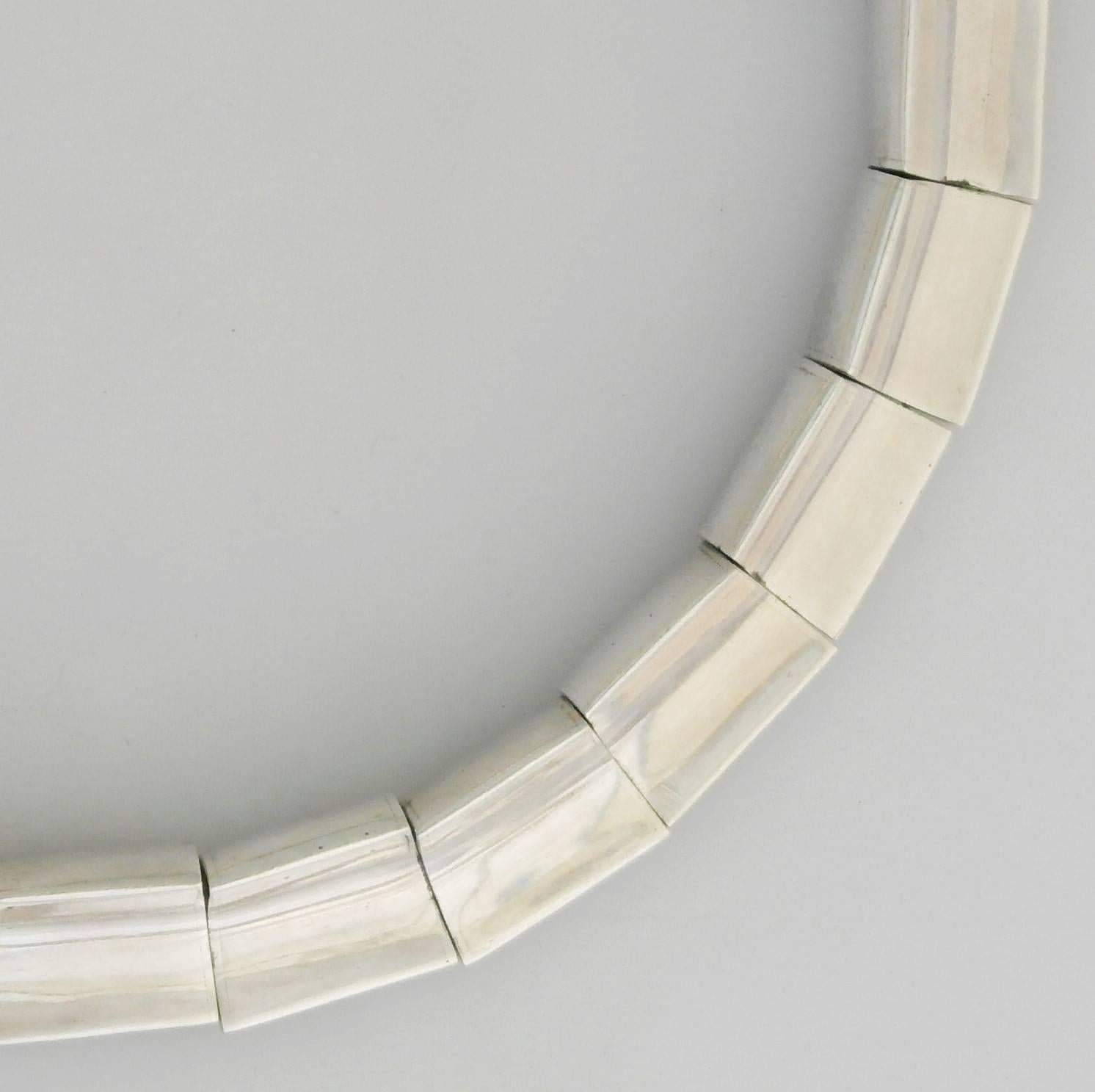 Being offered is a circa 1960 .970 (better than sterling) silver necklace by Antonio Pineda of Taxco, Mexico, choker necklace with concave links supported by a tongue & box closure. Dimensions wearable 14