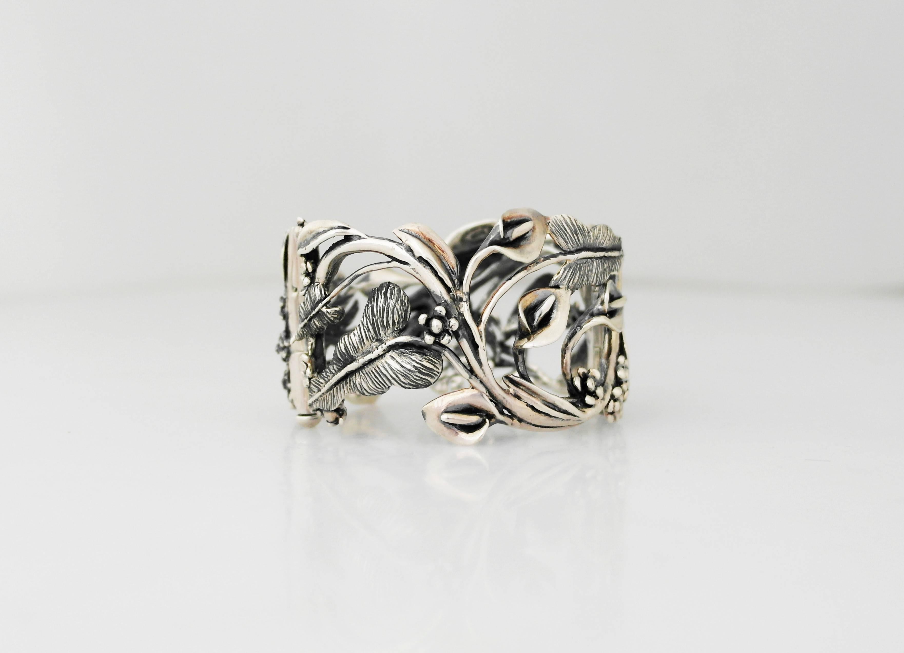 Being offered is a large and rare circa 1990 .950 silver (better than sterling) bracelet by Emilia Castillo of Taxco, Mexico. Heavy bracelet in a pierced design with intricate foliate. Dimensions: 7 1/4