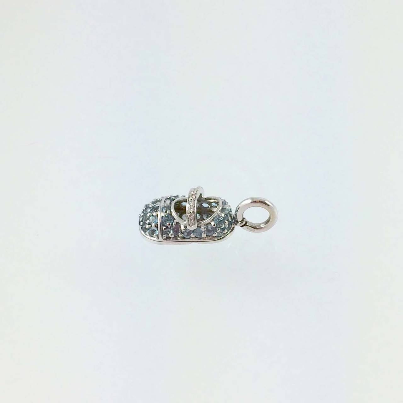 Aaron Basha Baby Shoe, 18K white gold, prong set with aquamarines and diamond strap pave set with full cut round diamonds, G color, VS clarity suspended from 18K white gold chain.