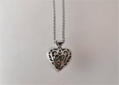 Diamond Gold Double Heart Pendant Suspended From Gold Chain