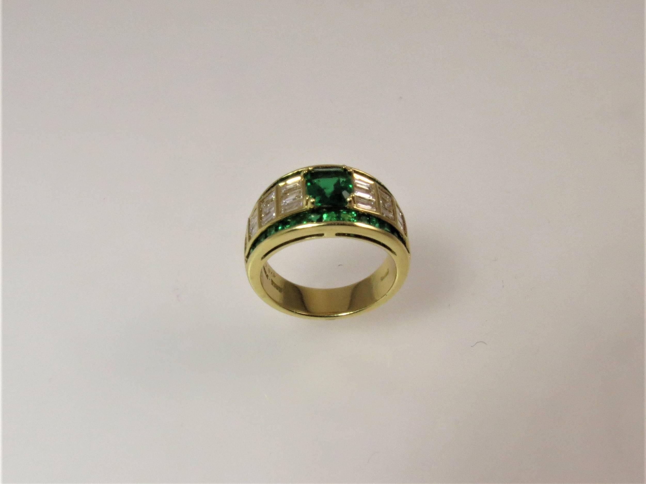 Picchiotti 18K yellow gold ring set in center with one square emerald cut emerald weighing .89cts, surrounded by 34 square emeralds weighing 1.07cts and 22 baguette diamonds weighing 1.20cts, F-G color, VS clarity.
Finger size 6.5, may be sized