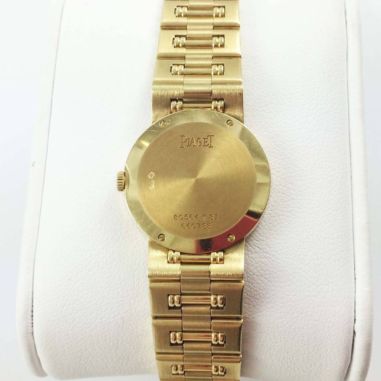 Piaget 18K yellow gold diamond Dancer bracelet watch, diamonds on bezel, gilt dial, gold dots on dial, gold hands, quartz movement.
New in box
Never worn
Original two year warranty
Retail price $22,400.00
