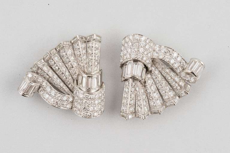 Platinum and diamond Art Deco circa 1920's double clip pin with removable frame set with 168 full cut round diamonds weighing about 10.00 carat total, and 38 straight baguette diamonds weighing about 5.0 carat, G color, VS clarity. May be worn as a