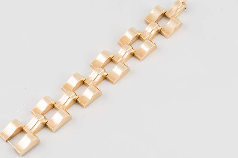 Retro 14k yellow gold bracelet, geometric design, flexible, one inch wide,  7.5 inches long.