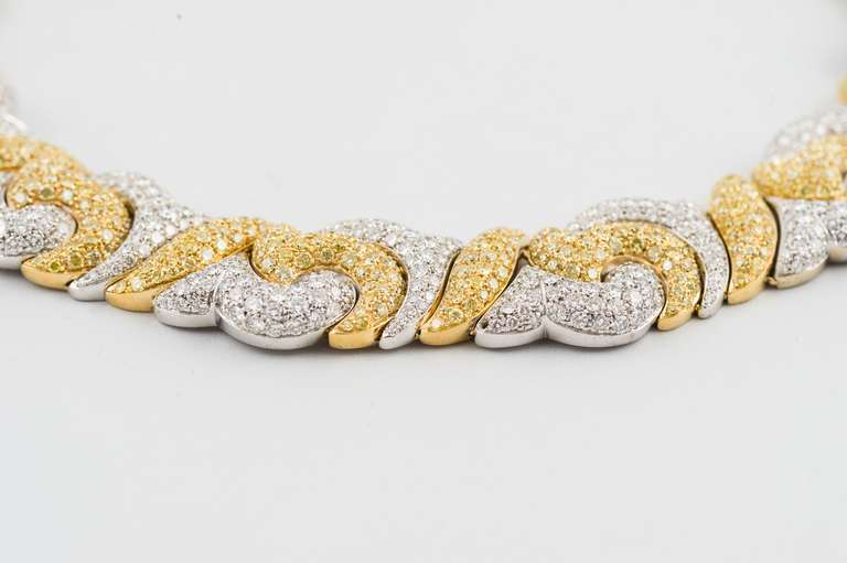 Picchiotti 18k yellow gold and platinum choker pave set with 528 full cut round diamonds, G color, VS clarity weighing about 12.28 carats, and 565 full cut round natural fancy yellow diamonds, VS clarity weighing about 13.77 carats.