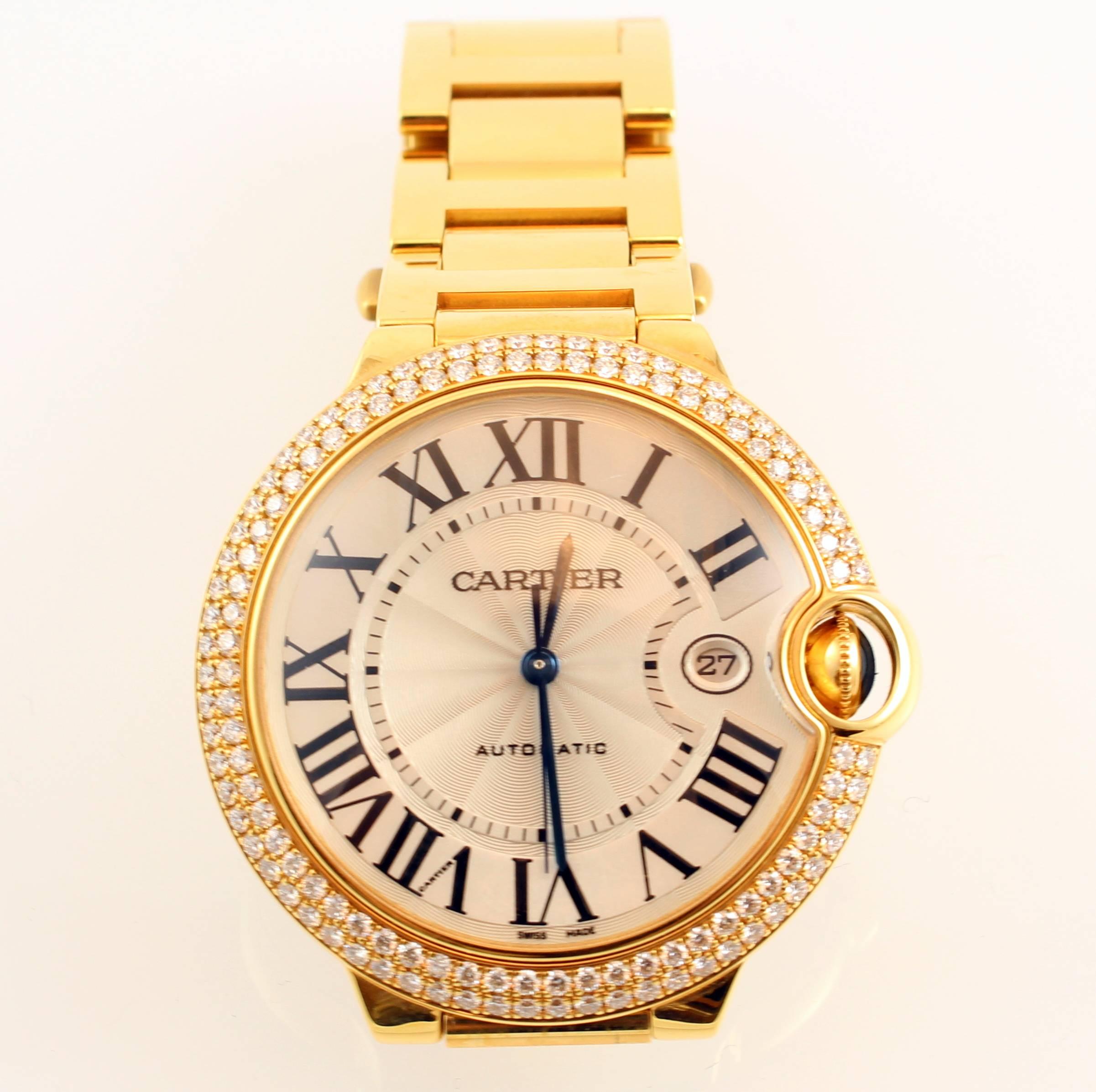 New 18K yellow gold diamond Ballon Bleu De Cartier bracelet watch, large, automatic movement, double row paved bezel, silvered opaline dial, guilloche and lacquered, blued steel sword-shaped hands, Roman numerals, date window, yellow gold bracelet.