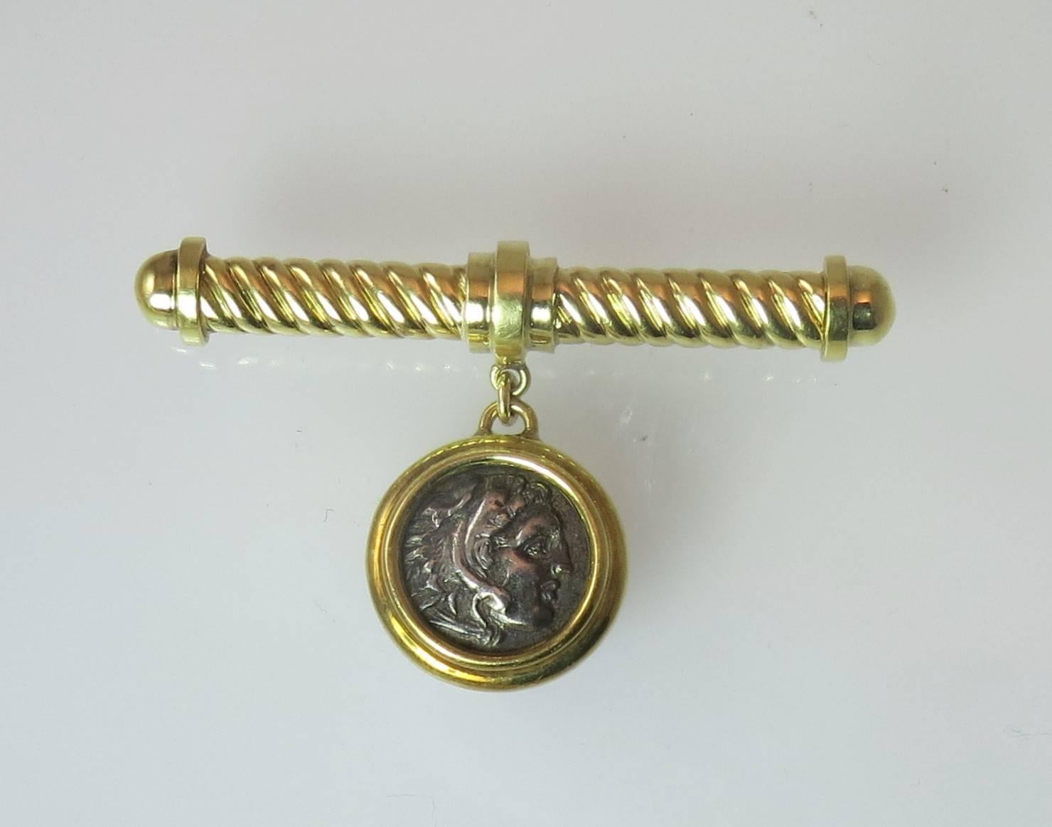 18K yellow gold bar pin with Alexander the Great coin,bezel set,suspended from gold scroll bar.
