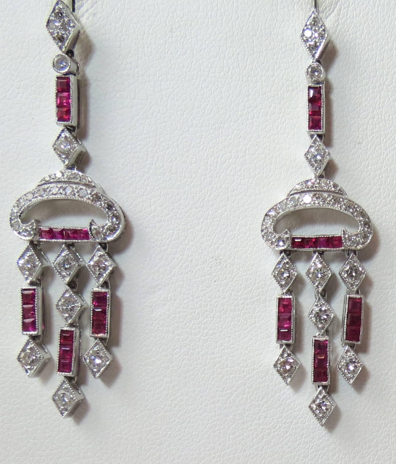 Vintage style 18K white gold diamond and ruby drop earrings, set with 32 square cut rubys weighing about 1.20cts, and 18 round full cut diamonds weighing about .75cts and 44 single cut diamonds weighing about .50cts.

