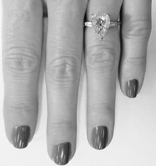 Classic 2.76ct Pear Shape Diamond with Tapered Baguettes in Platinum Mounting