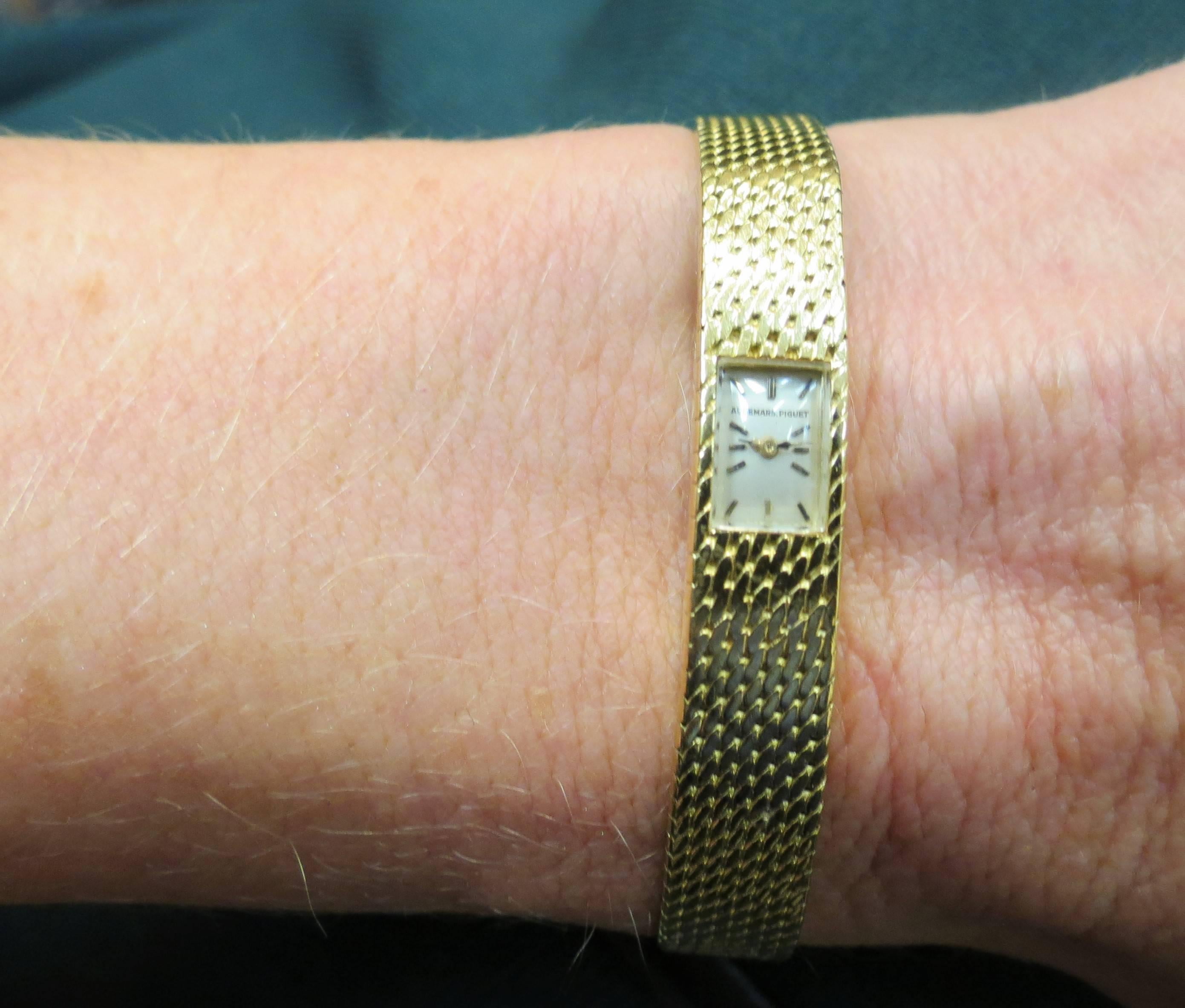 Ladies Audemar Piquet 18K yellow gold, mechanical movement, backwind, stick markers, mesh bracelet watch, excellent condition.
Considered to be one of the smallest watches ever made
Length of bracelet 6.25 inches
Width of bracelet .25
