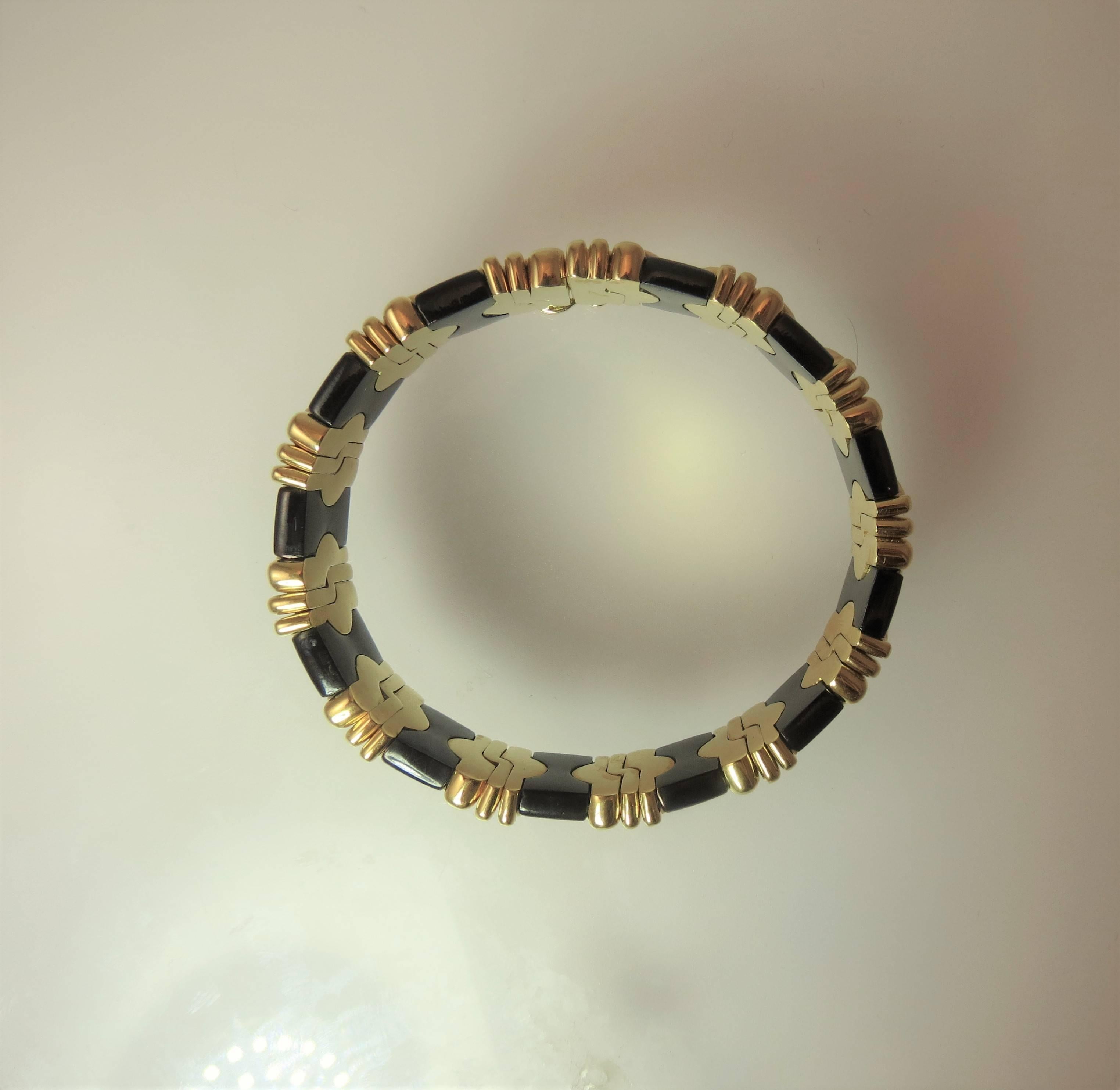 Stunning 18K Yellow Gold Anodized Steel Bangle Bracelet In Excellent Condition In Chicago, IL