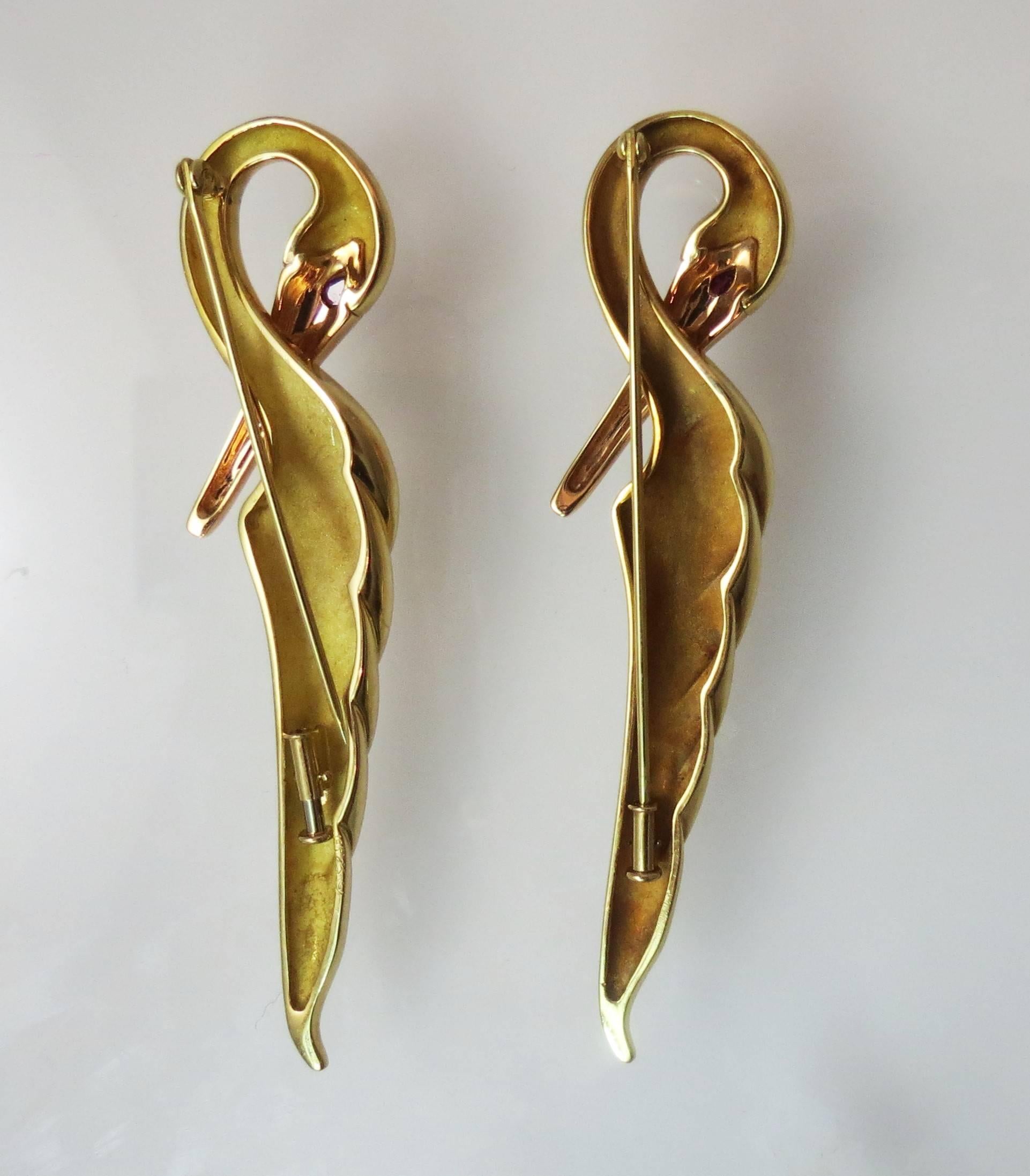 Fantastic pair of 18K yellow gold Michael Bondanza Swan Pins with ruby eyes. 
Length 3.25 inches long
Total weight for both 46 grams