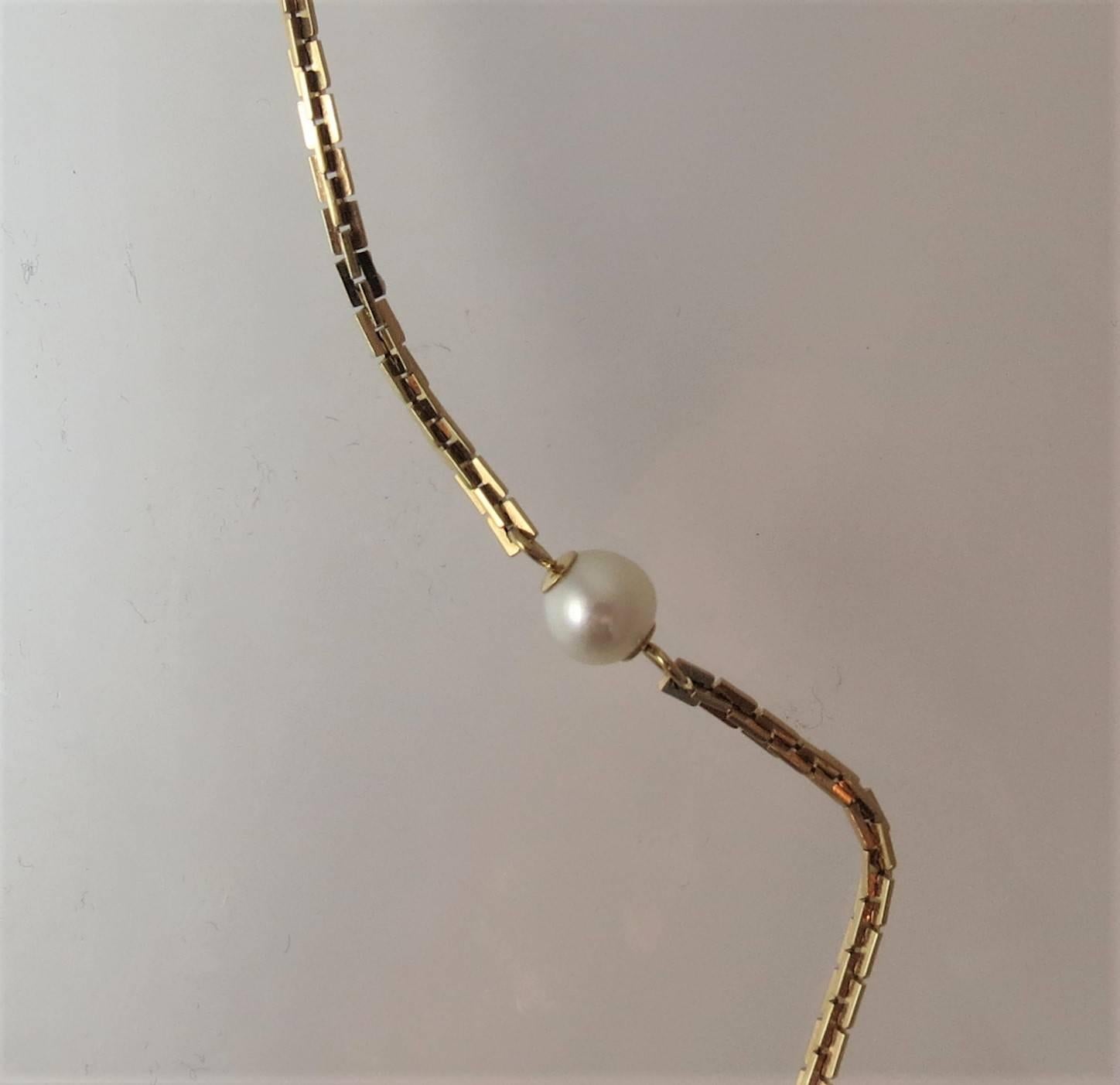 Tiffany 14K yellow gold neck chain with 7 cultured pearls, measuring 6.4-6.7mm, length of chain 29 inches