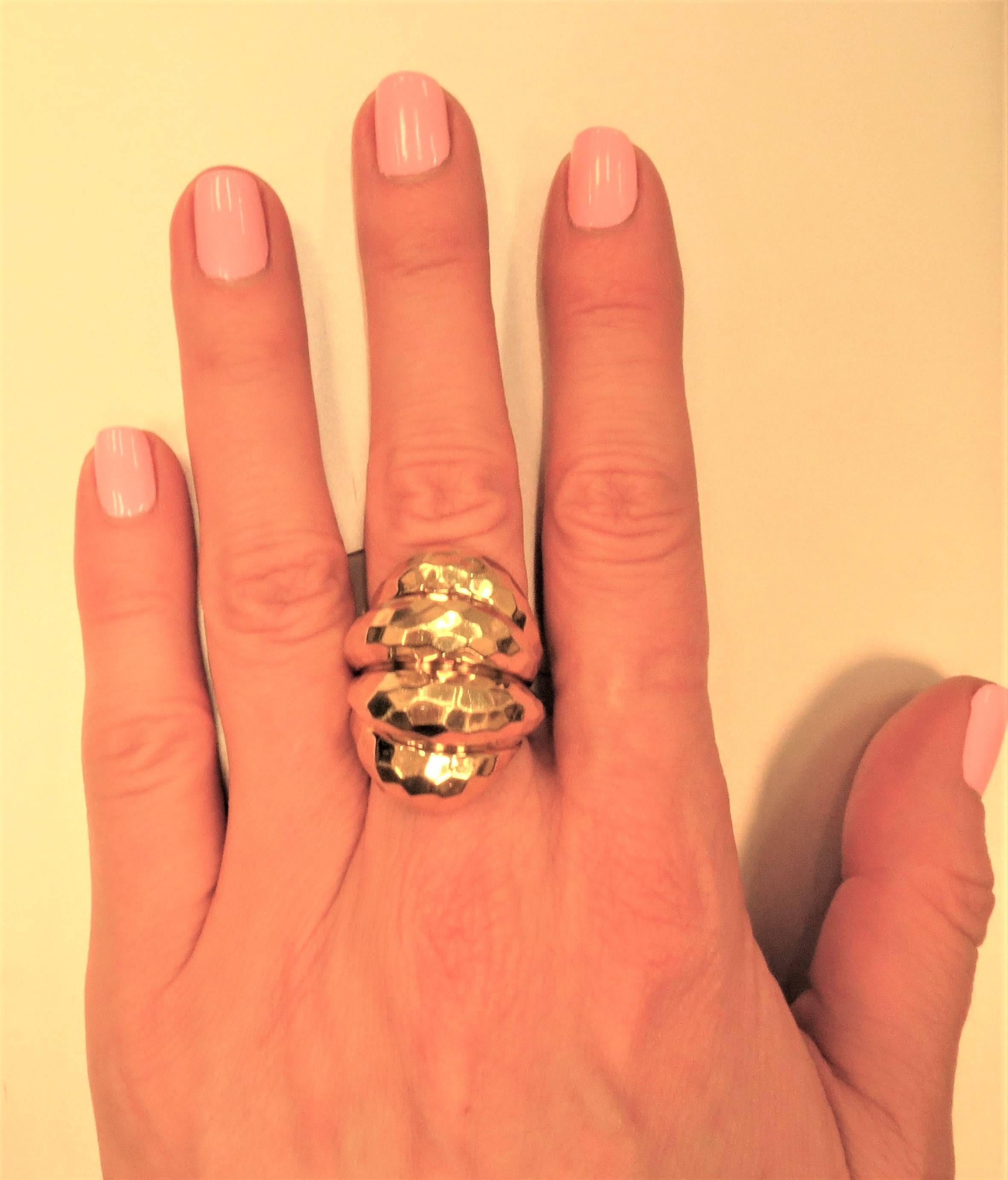 Henry Dunay 18K yellow gold, faceted texture ring, timeless and very fashionable.

Finger size 6.5. May be sized