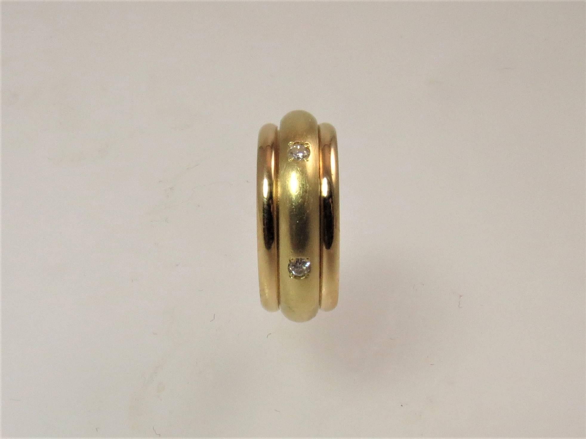 Contemporary Yellow Gold Band Ring with Middle Spinning Diamond Band For Sale