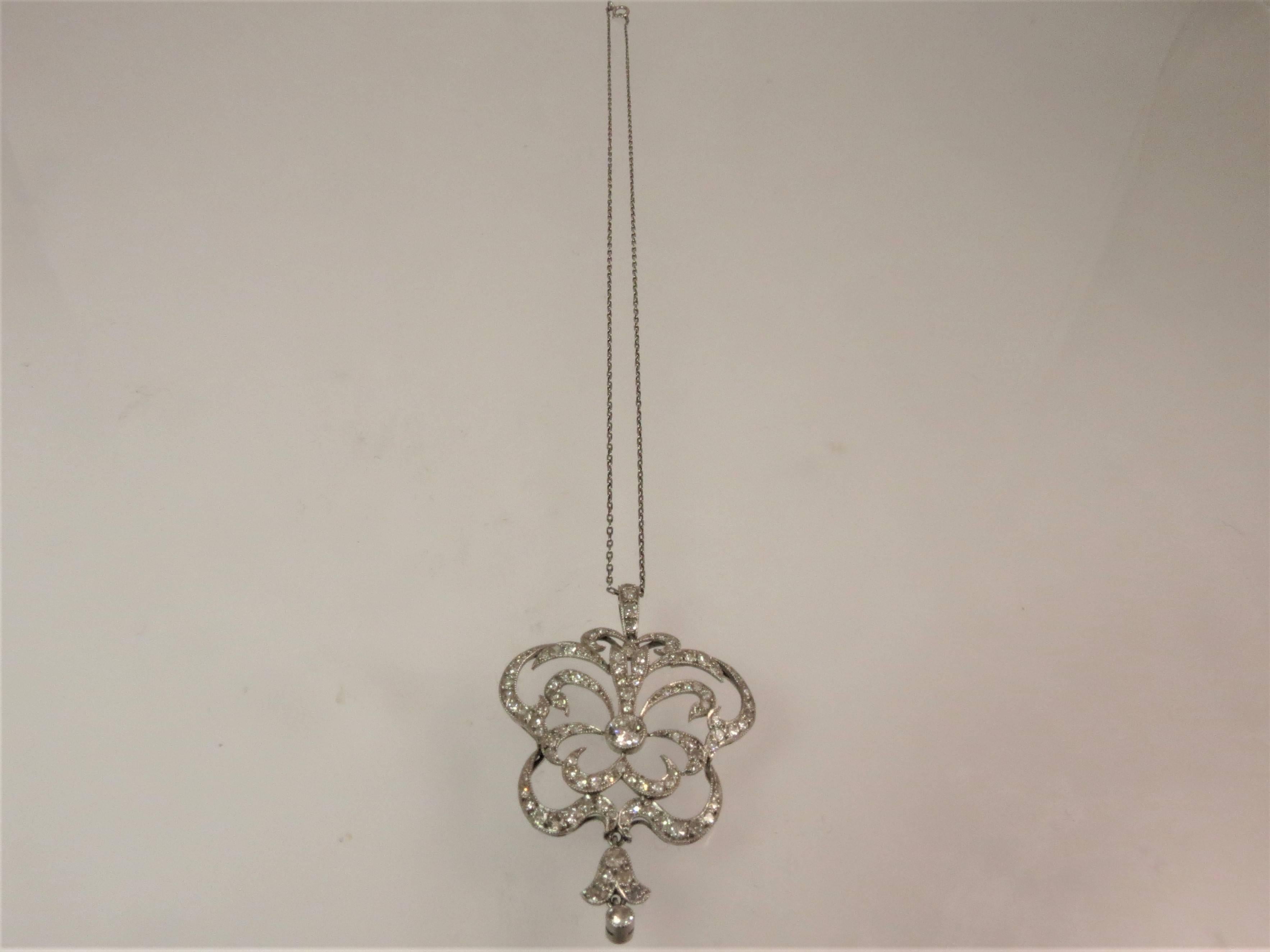 Contemporary Diamond Platinum Pendant Suspended from a Platinum Chain For Sale