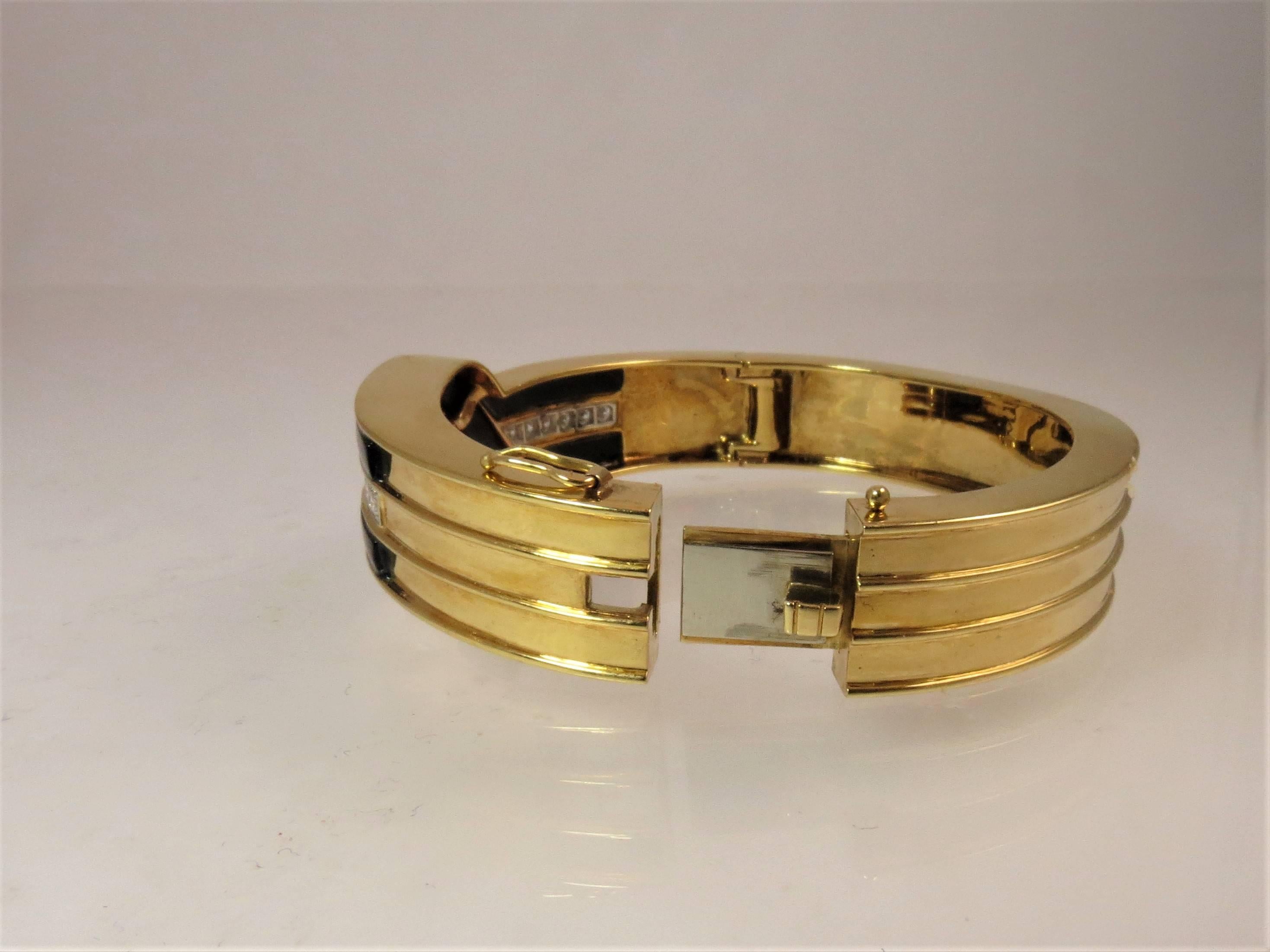 Contemporary 18 Karat Yellow Gold and Platinum, Diamond and Black Onyx Bangle Bracelet For Sale