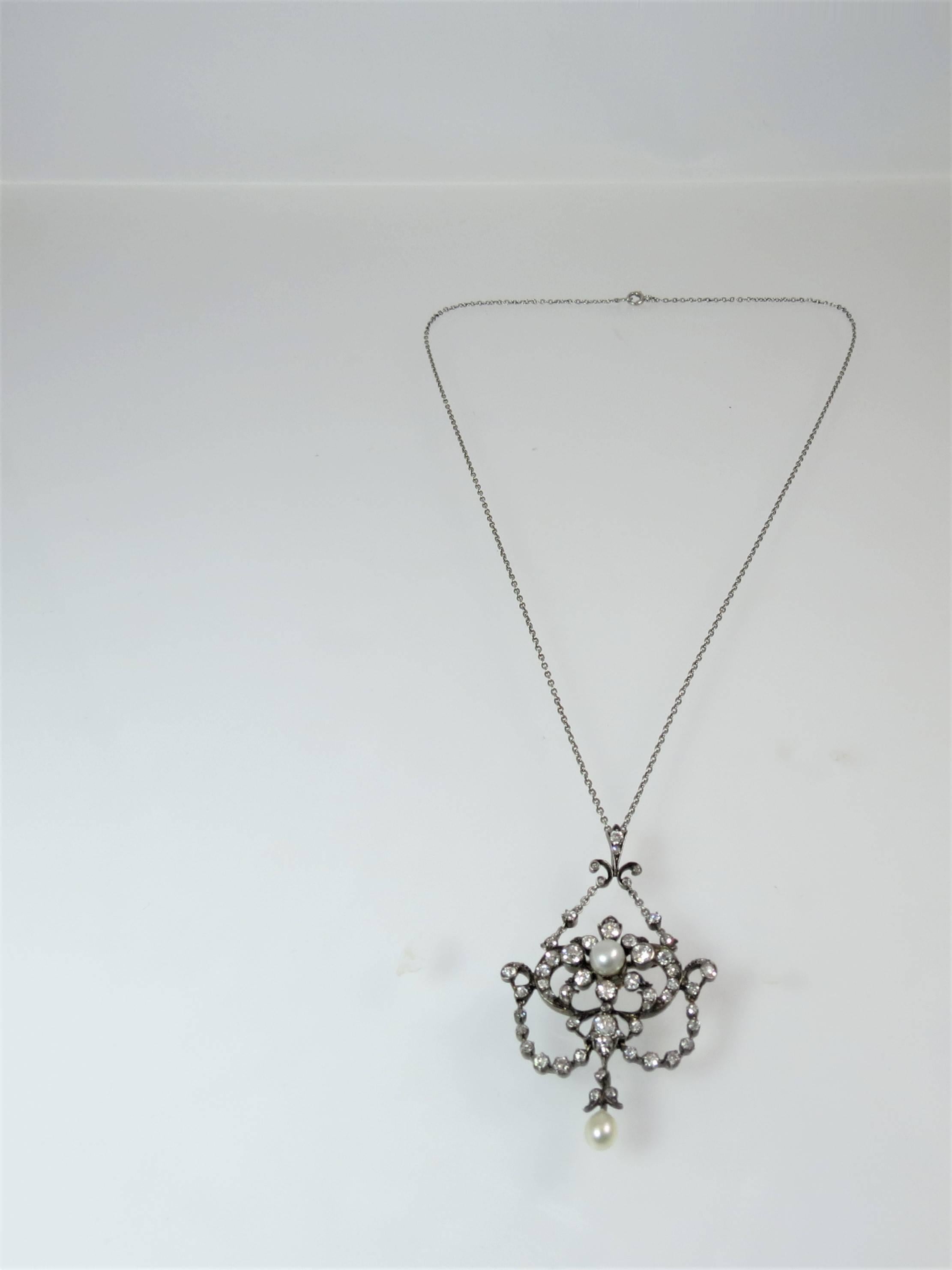 Edwardian Pendant, Silver over Gold with Pearl and Diamond on Platinum Chain In Excellent Condition For Sale In Chicago, IL