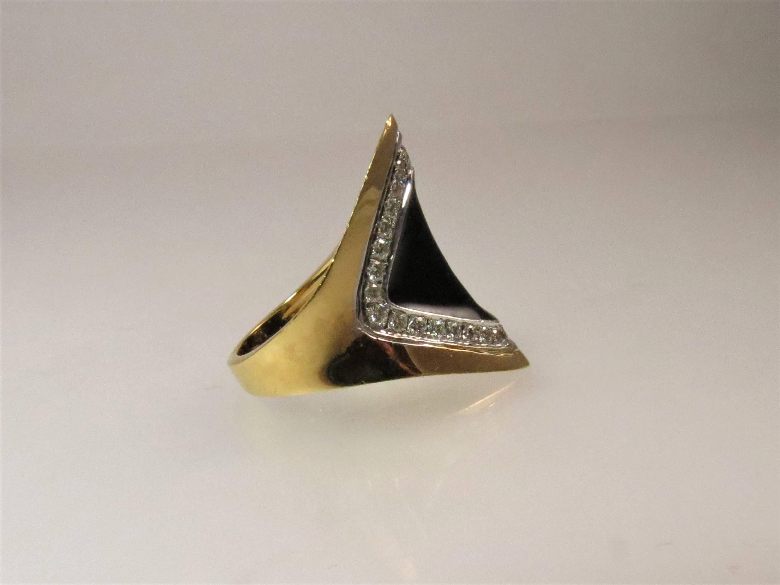 Contemporary 18 Karat Yellow Gold Diamond and Black Onyx Ring For Sale