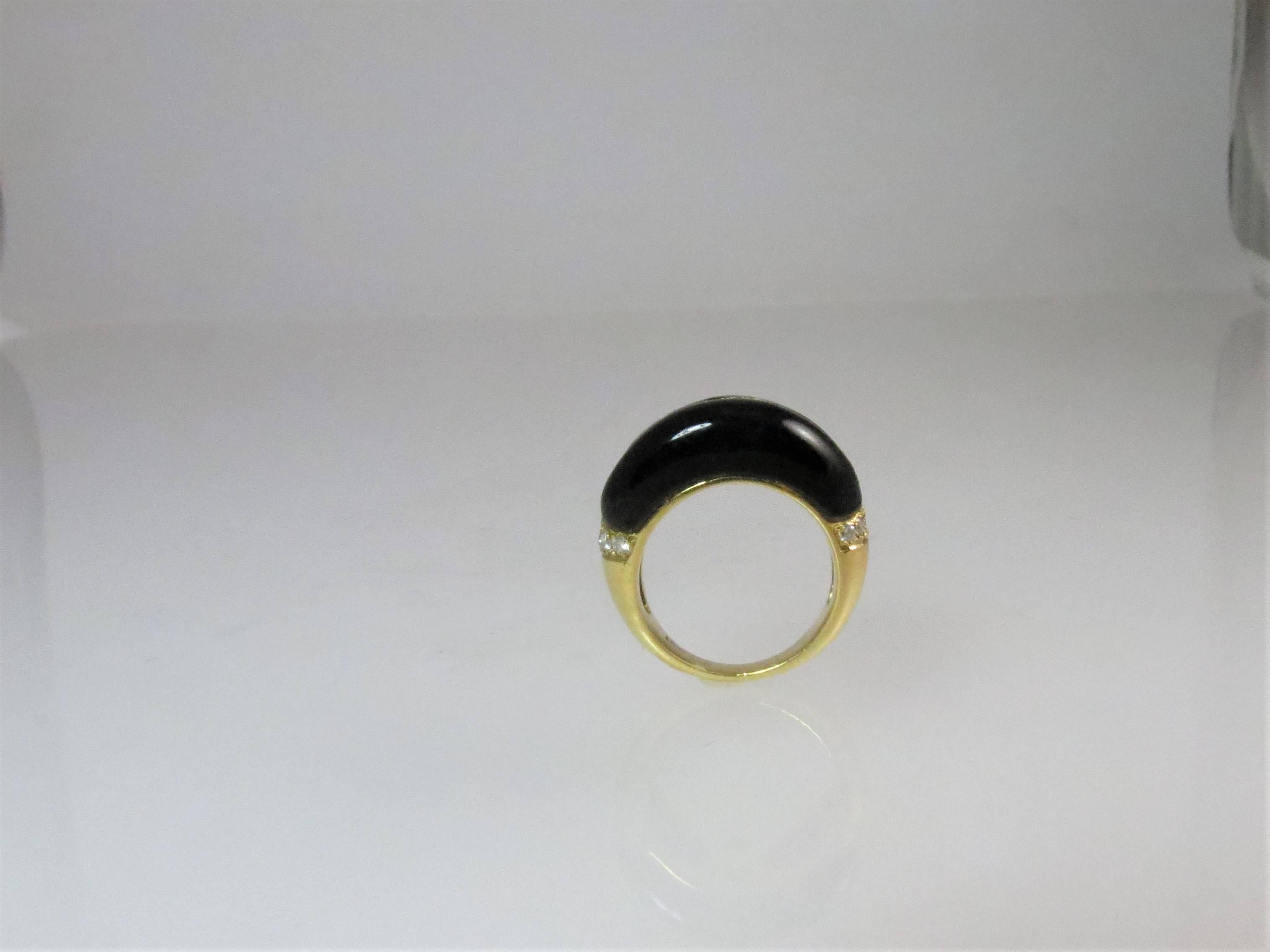 Contemporary 18 Karat Yellow Gold, Black Onyx and Diamond Band Ring