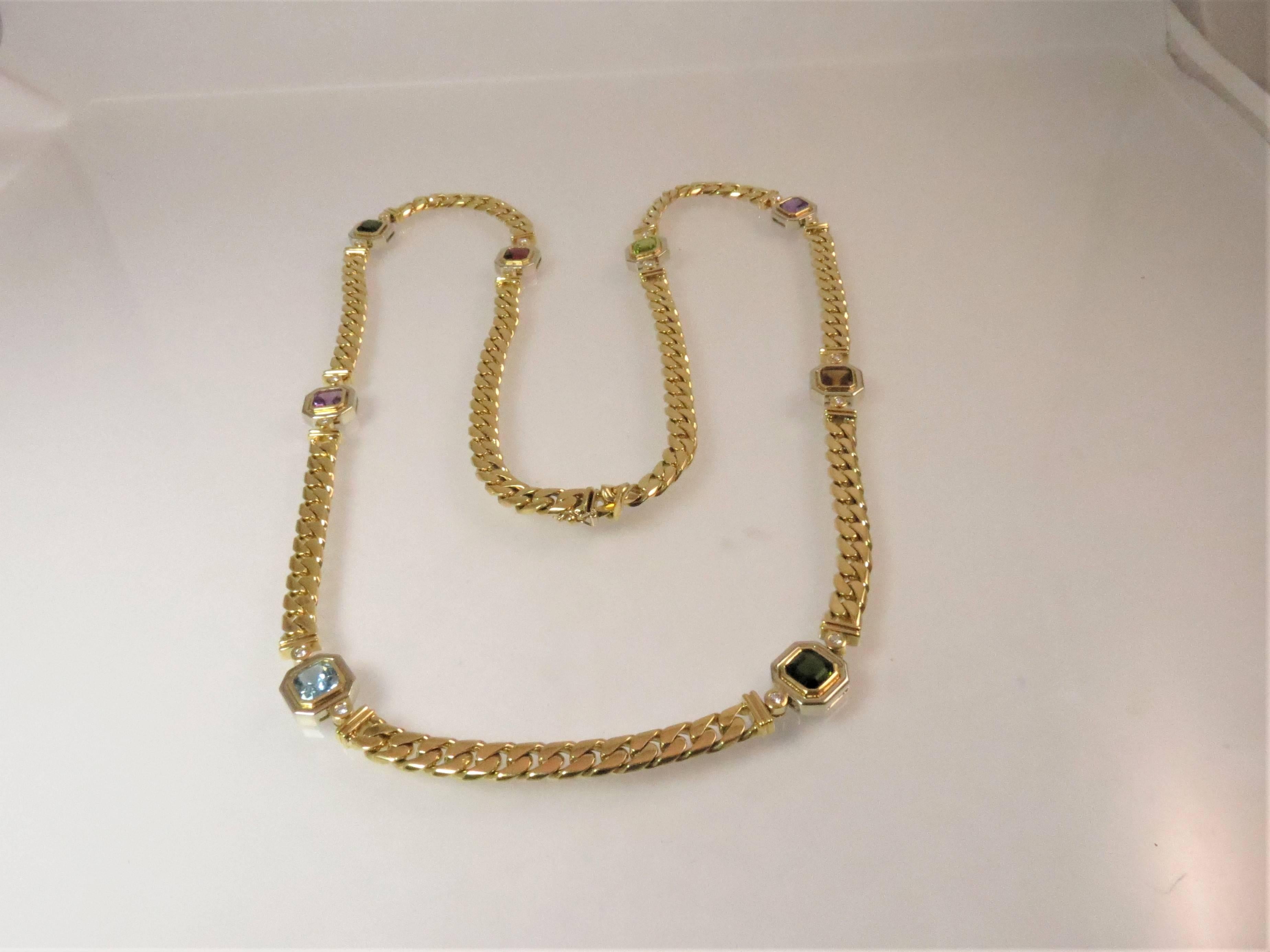 Catena in oro giallo 18 carati, castone con ametista quadrata sfaccettata, tormalina, granato, topazio blu, peridoto e 16 diamanti rotondi taglio pieno del peso di 0,97 carati, colore G-H, purezza VS-SI1.